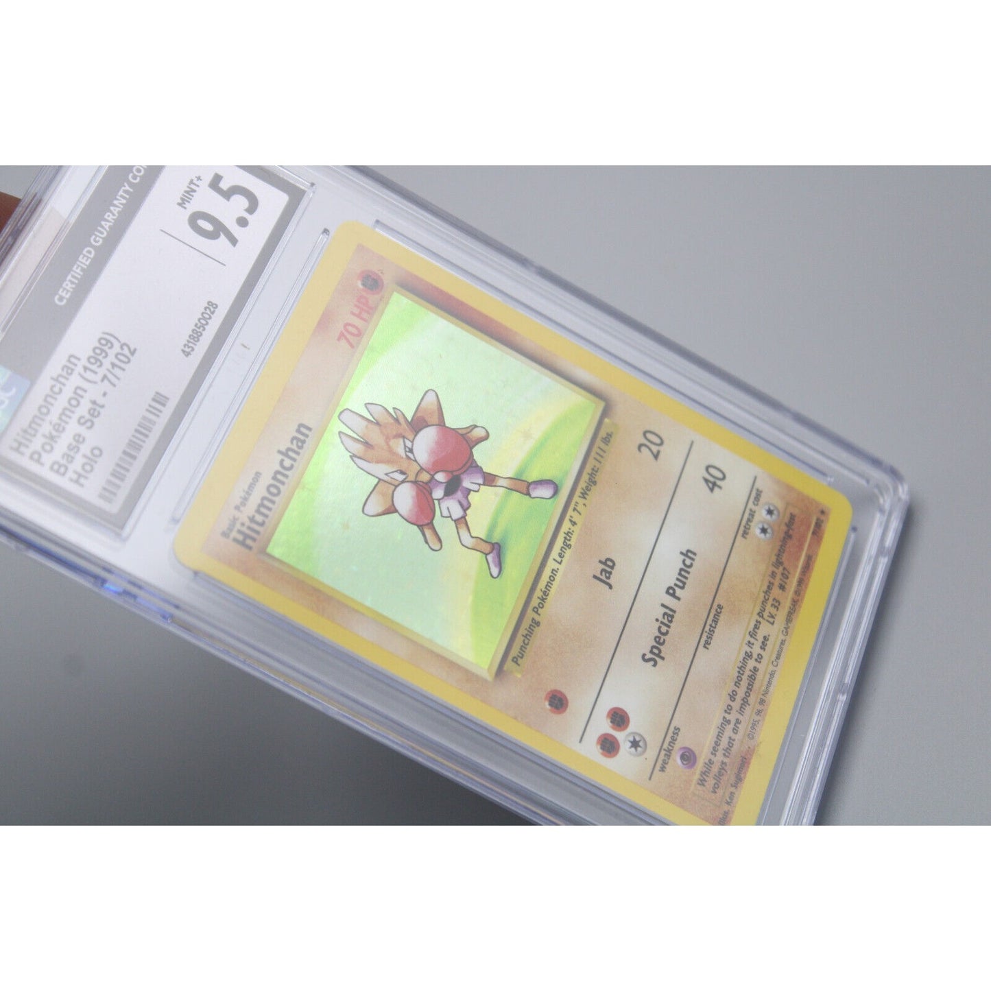 Pokemon TCG Hitmonchan Base Set Holo Card 7/102 CGC Graded 9.5 MINT+ 1999